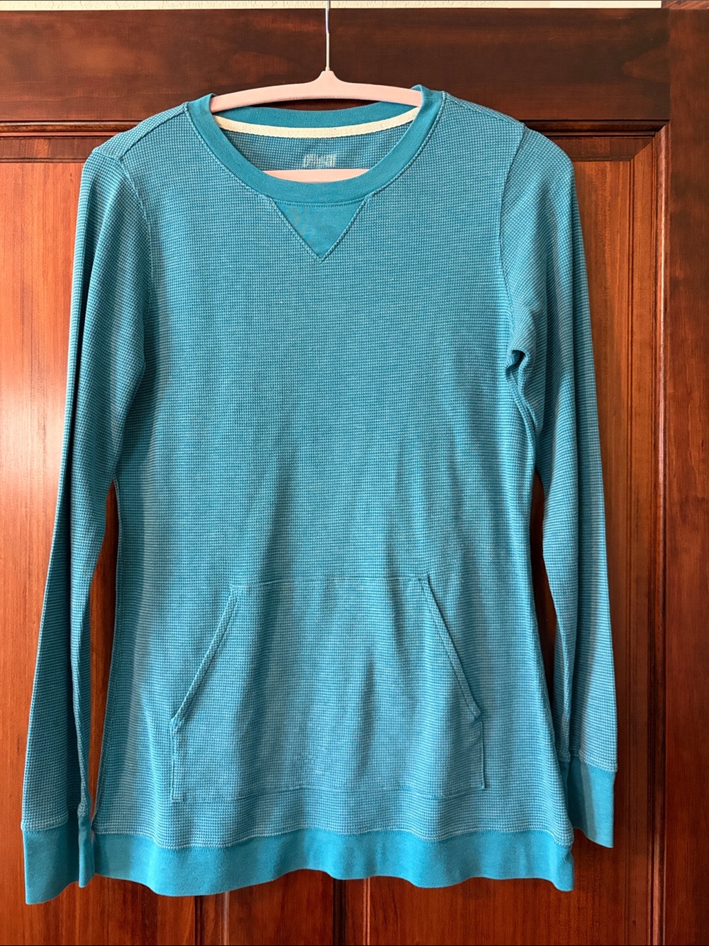 Women’s Teal Duluth Trading Co. Long-Sleeve Lightweight Pullover.